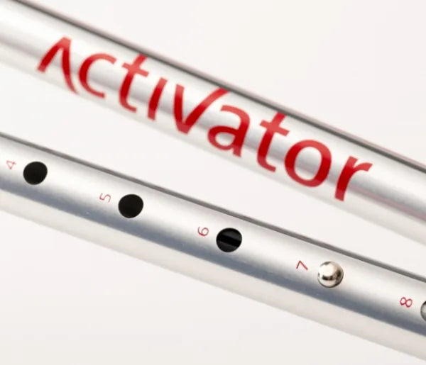 Metallic flute with 'Activator' text on a white background