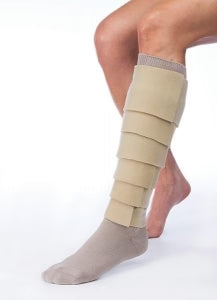 A beige compression leg sleeve with multiple horizontal support bands worn on a person's lower leg, paired with a taupe sock, shown against a plain white background.